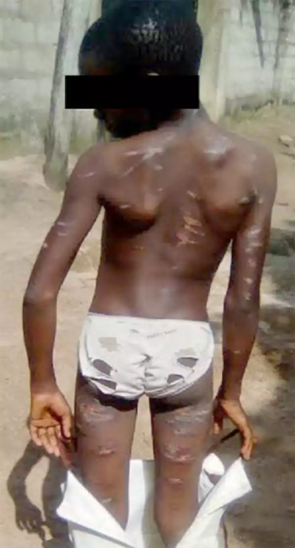 OMG!! What This Man Did To This Little Boy Will Leave You Speechless (See Photos)
